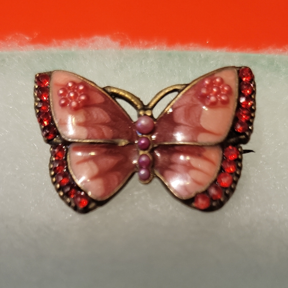 Elegant Butterfly Brooch with Red and Pink Accents